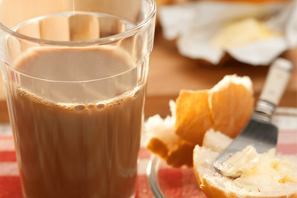 Brazilian pingado drink with french bread