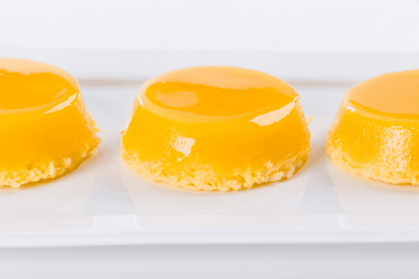 Bright yellow Brazilian quindim custards